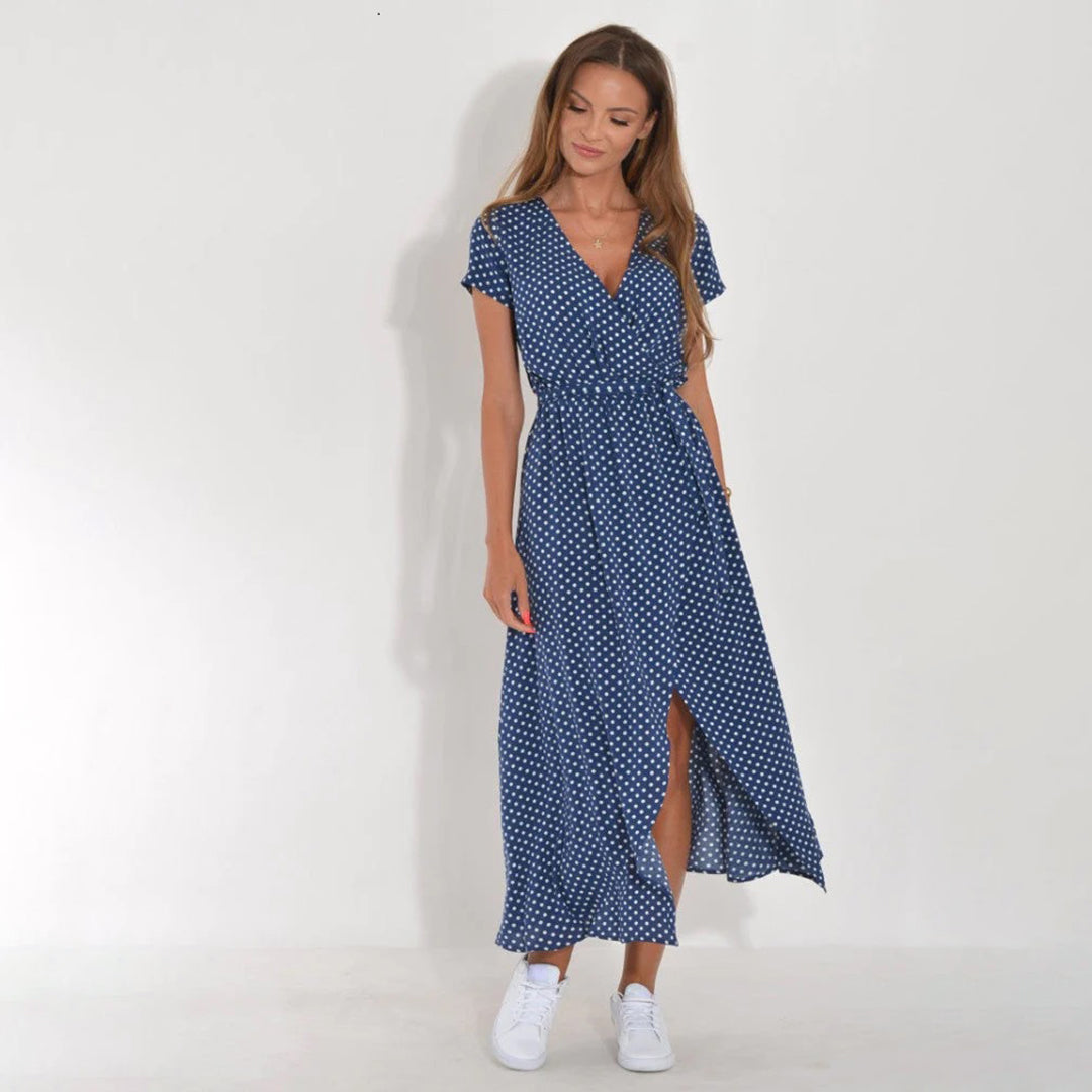 Chic women's floral short sleeve wrap midi dress, comfortable and stylish for spring and summer.