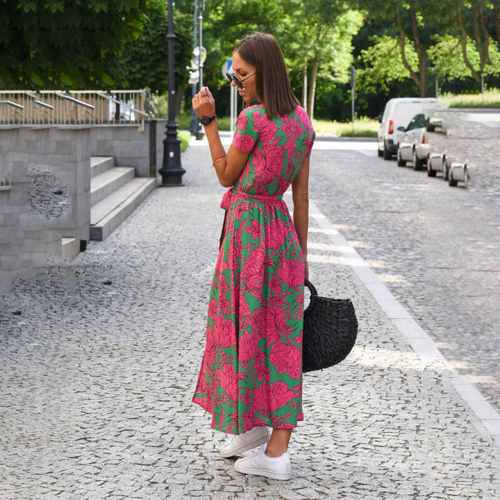 Beautiful women's floral wrap midi dress with short sleeves, designed for effortless style.