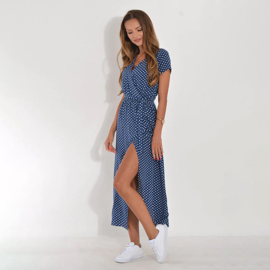 Feminine floral print wrap midi dress for women, short-sleeved, great for spring outings.