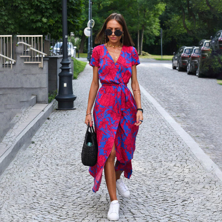 Women's elegant floral wrap midi dress with short sleeves, perfect for spring and summer events.