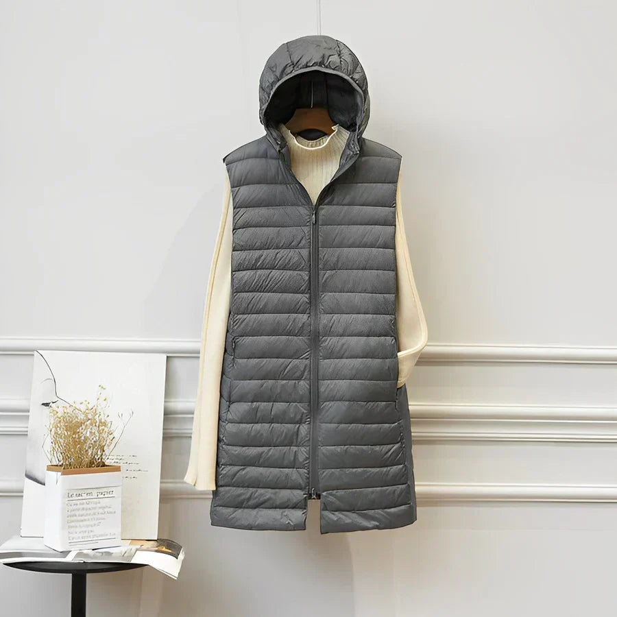 Stylish khaki long sleeveless vest. Elegant women's layering jacket, perfect for chic all-season fashion.