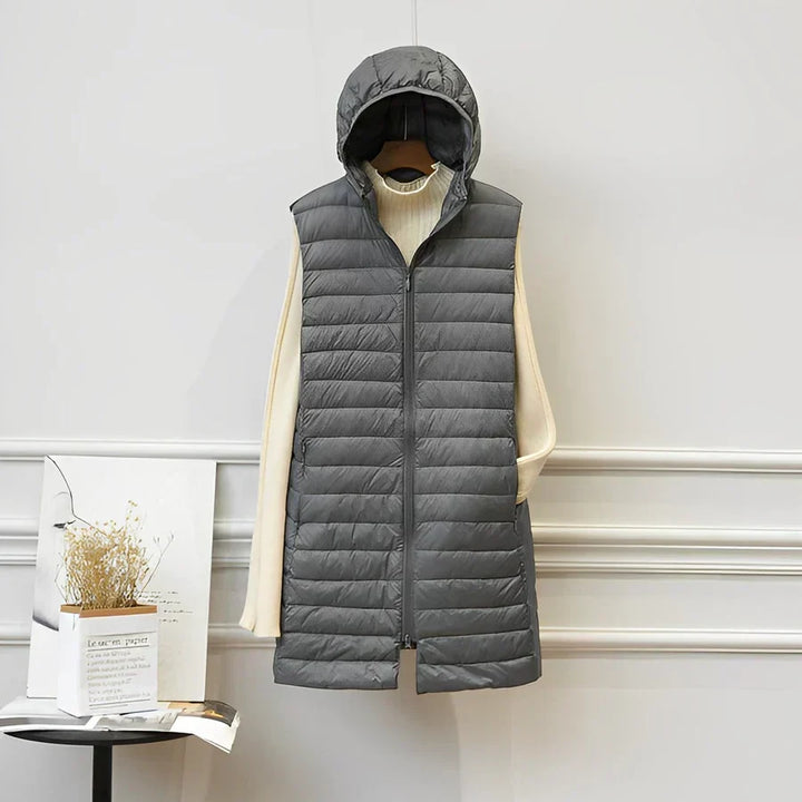 Stylish khaki long sleeveless vest. Elegant women's layering jacket, perfect for chic all-season fashion.