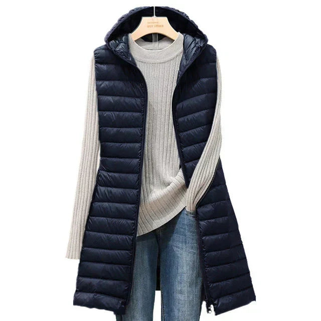 Chic black long sleeveless jacket. Elegant women's versatile layering vest, ideal for modern all-season wear.