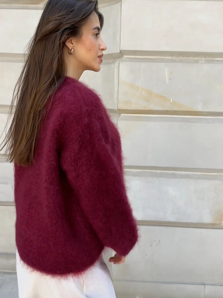 Soft-touch long sleeve women's sweater. A comfortable, round neck oversized top for casual winter wear.
