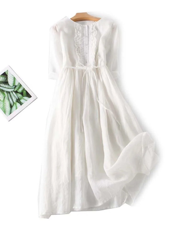Flowy women's summer O-neck dress with ruffles, offering effortless elegance for beach, holiday, & casual chic.