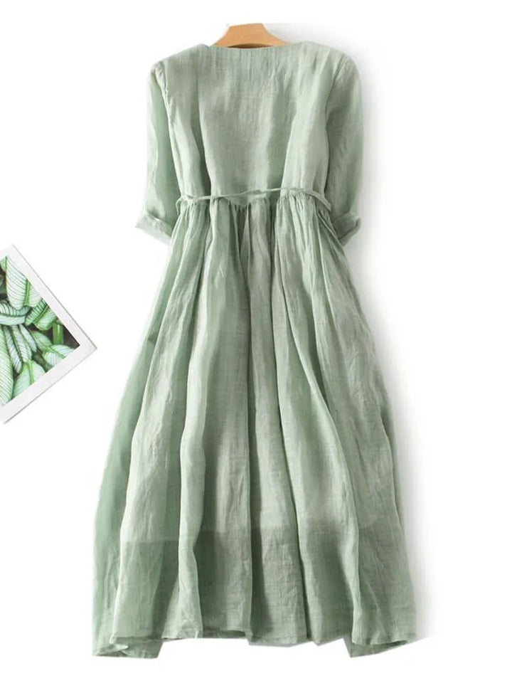Chic women's short summer dress featuring stylish ruffles & an O-neck. Versatile for casual or elegant occasions.