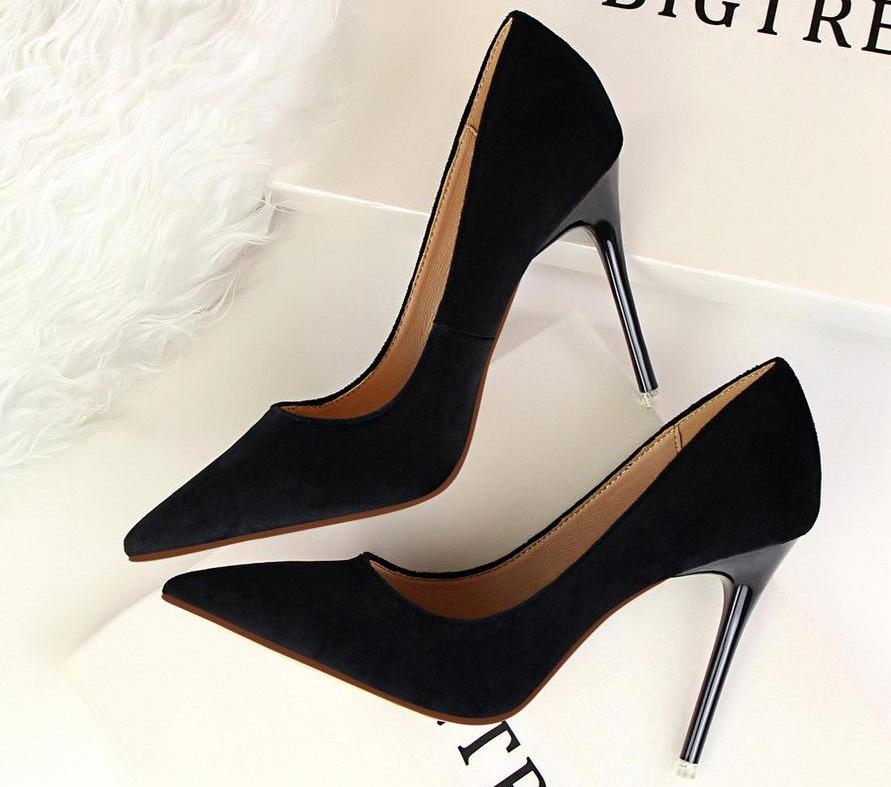 Detail shot of the high heel on women's elegant Roman shoes, offering comfort and stylish elevation.