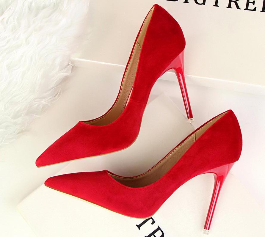 Pair of elegant women's Roman high heels, versatile footwear designed for comfort & classic fashion.