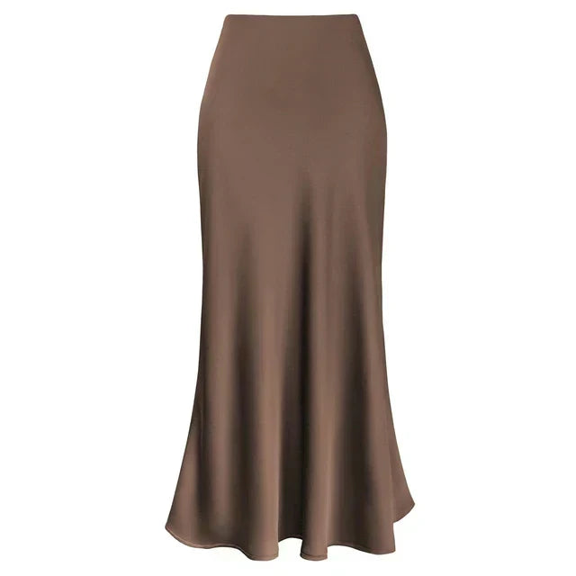 Luxurious long shiny satin skirt for women, an elegant fashion statement. High-waist midi for special events.