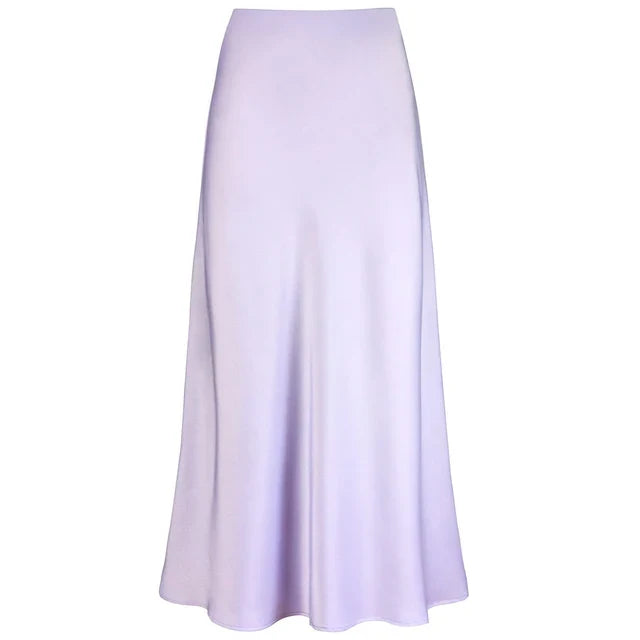 Versatile women's fashion long satin skirt for elegant style. Shiny high-waist midi, great for parties.
