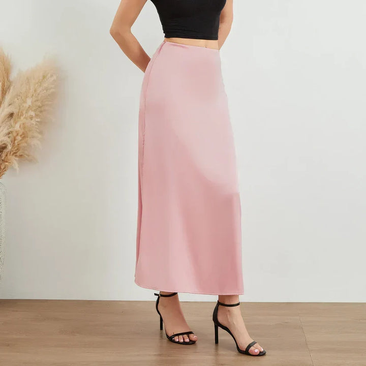 Stunning women's long shiny satin skirt, elegant fashion for party & evening wear. High-waist midi style.