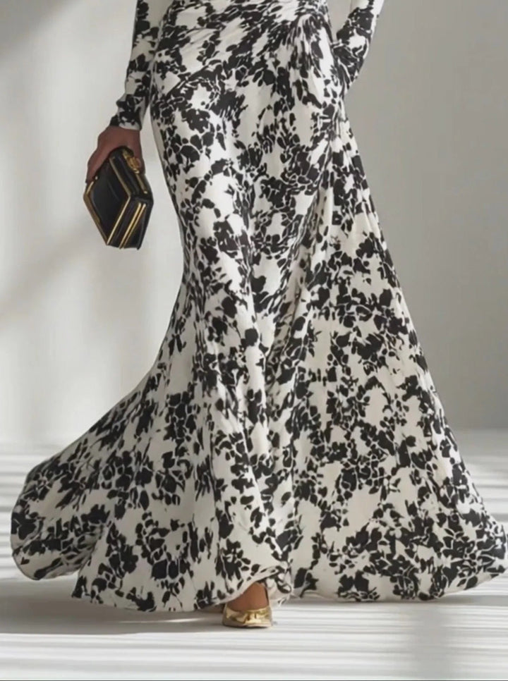 Sophisticated black & white floral print elegant maxi wrap dress for women. A stylish choice for formal evening events.