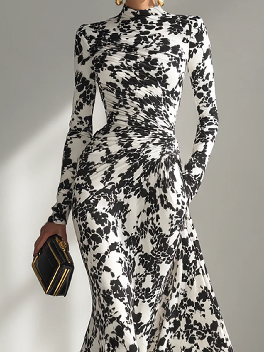 Women's black & white floral maxi wrap dress with long sleeves & high neck. Ideal for autumn/winter parties.