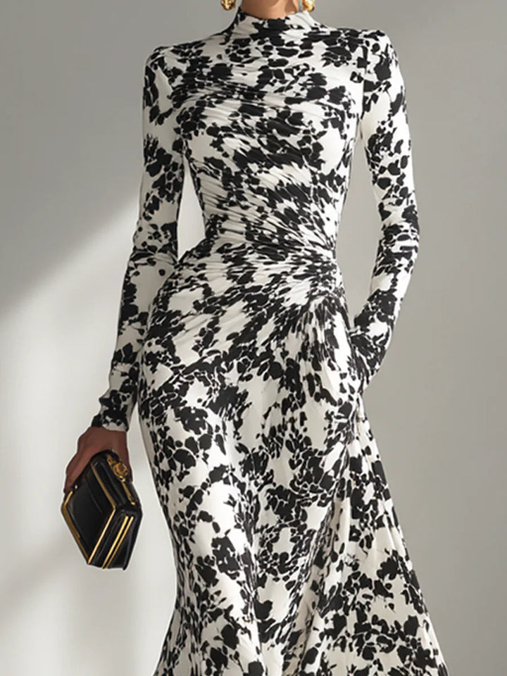 Women's black & white floral maxi wrap dress with long sleeves & high neck. Ideal for autumn/winter parties.
