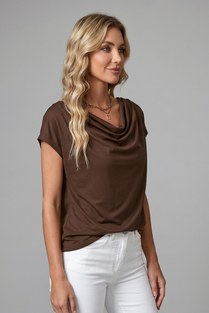 Chic women's short sleeve blouse with a comfortable draped cowl neck, ideal for fashionable apparel.