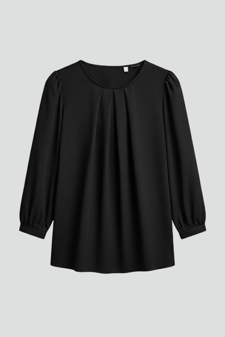 Women's puff sleeve blouse with a round neckline. Elegant & stylish long sleeve top.