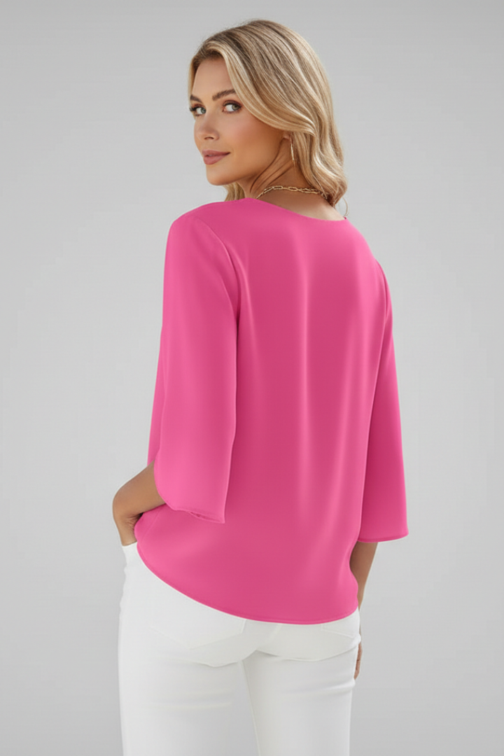 Comfortable women's V-neck short sleeve blouse, featuring a stylish chest pocket for effortless spring outfits.