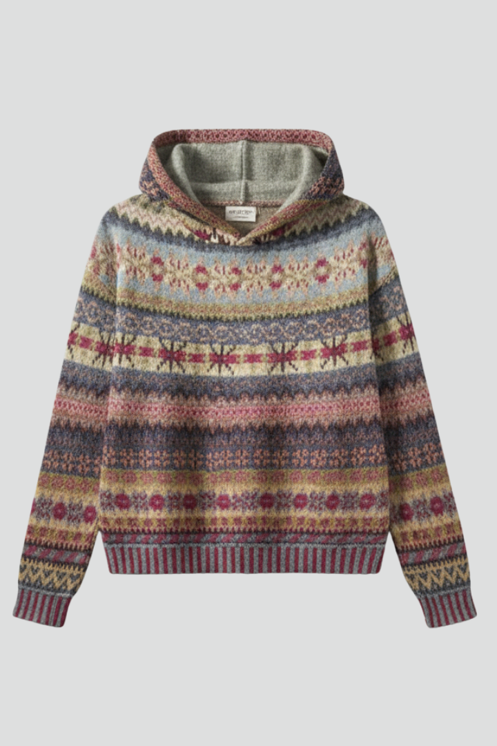 Women's patterned hoodie, a cozy hooded sweatshirt with ribbed cuffs for casual winter fashion.