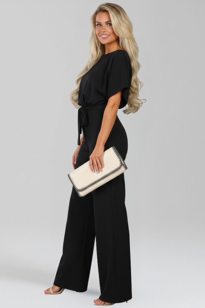 Effortless summer style: women's one-piece wide-leg jumpsuit with a chic and adjustable tie-belt.