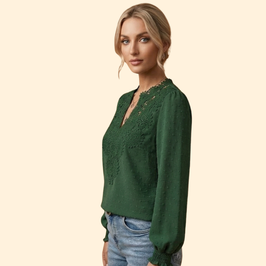 Sophisticated women's blouse with elegant lace and embroidery, perfect for stylish ladies fashion.