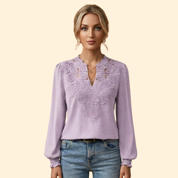Side view of a fashionable women's lace embroidered blouse, showcasing its elegant and versatile design.
