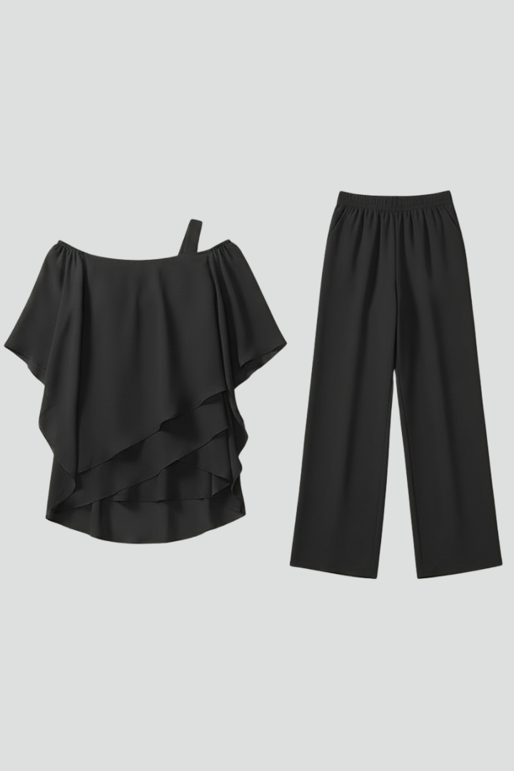 Women's flowing off-shoulder wide-leg jumpsuit. Elegant summer fashion for versatile wear.