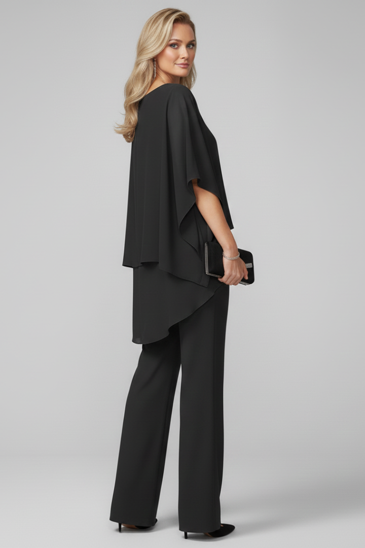 Relaxed fit women's flowing wide-leg off-shoulder jumpsuit. Comfortable summer fashion statement.