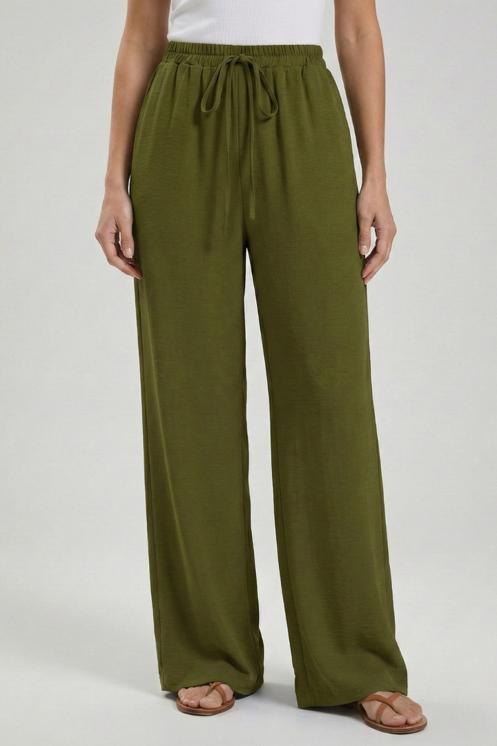Versatile women's palazzo trousers; drawstring & pockets. Perfect for casual or smart-casual wear.