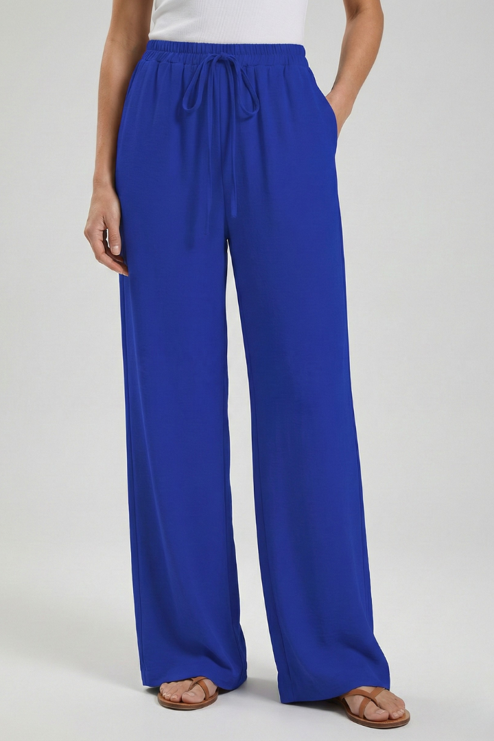 Comfortable women's palazzo trousers, wide leg & drawstring for a relaxed summer fit.