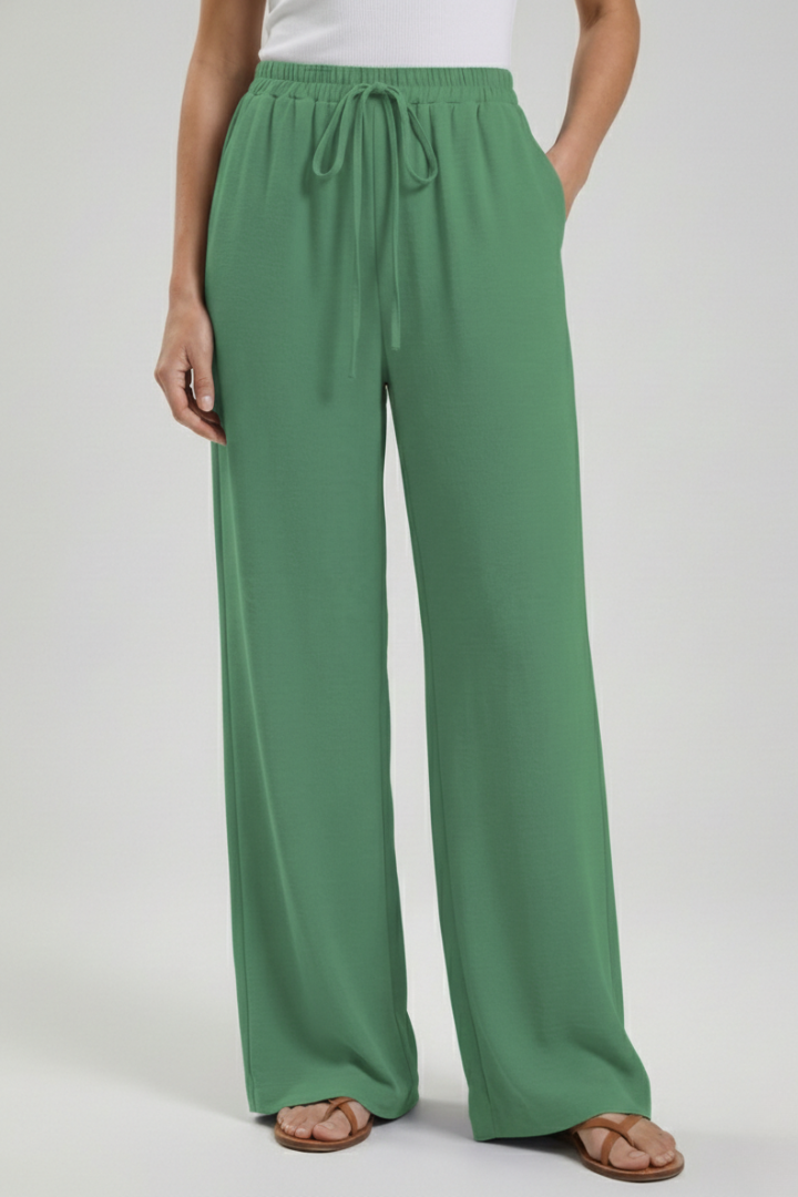Ultra-comfortable women's palazzo trousers, wide leg design & easy drawstring waist with pockets.