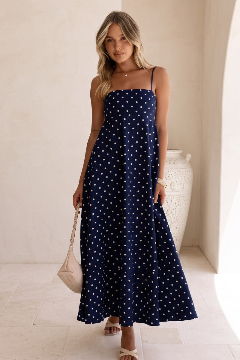 Summer-ready women's flowy polka dot maxi dress, sleeveless design, perfect casual and elegant vacation wear.