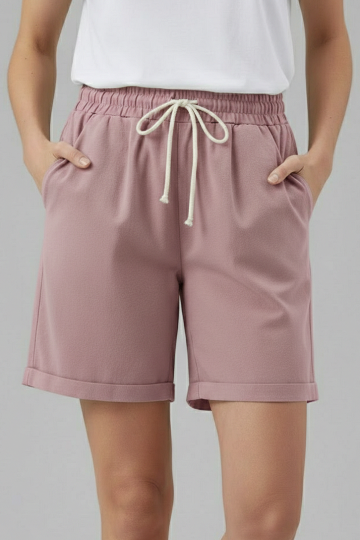 Lightweight women's summer shorts, elastic waist, drawstring, and practical pockets.
