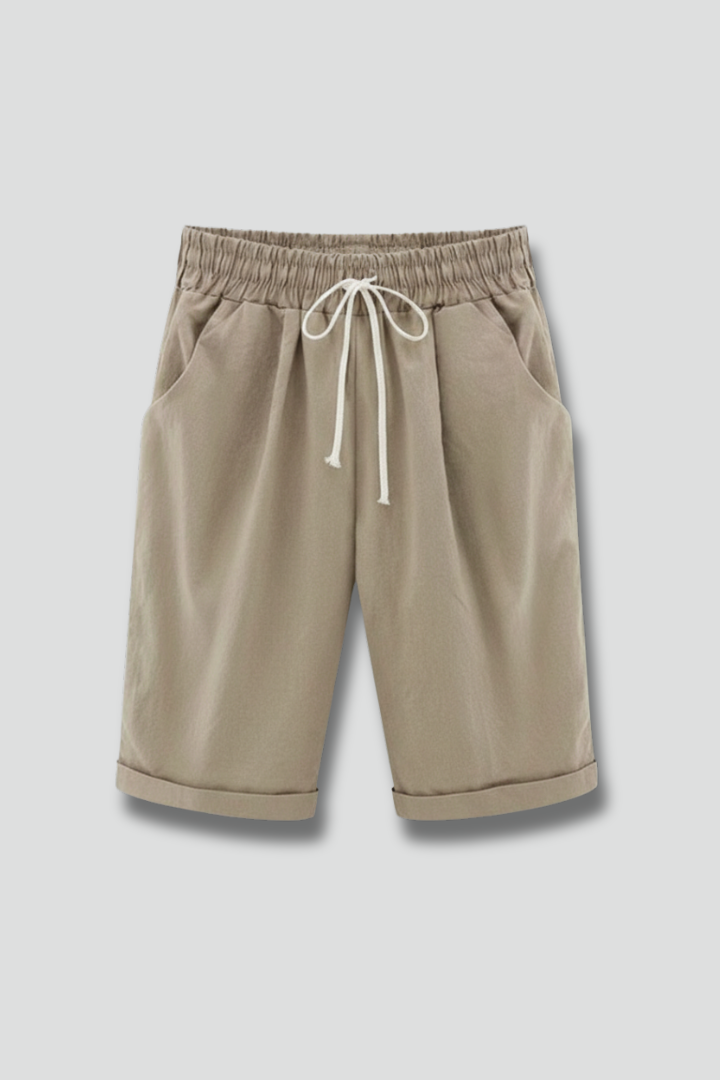 Women's relaxed fit drawstring shorts with pockets for summer style.