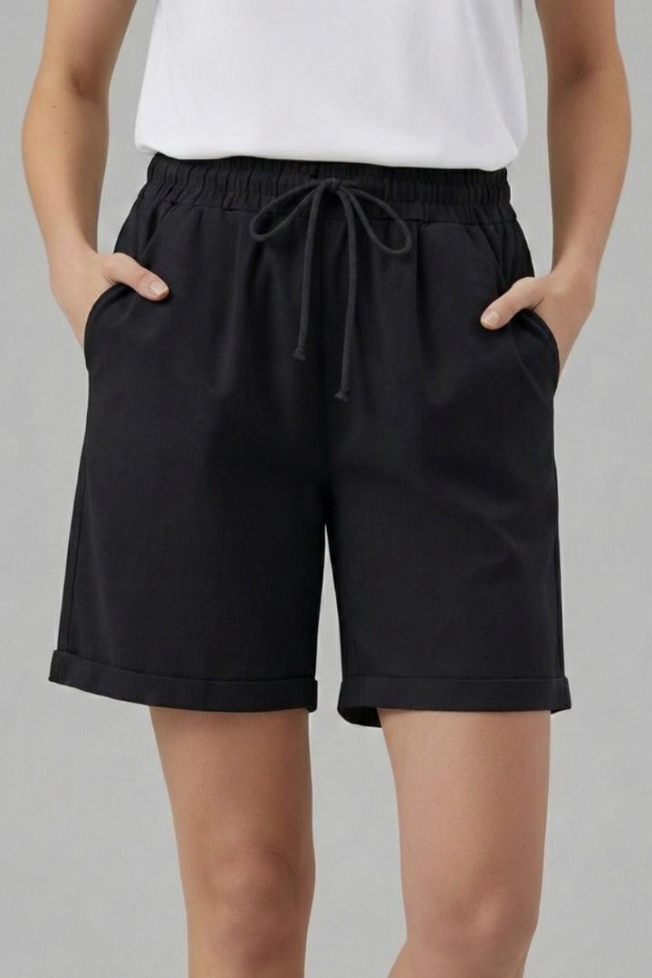 Women's vacation drawstring shorts with pockets, offering a relaxed and comfy fit.