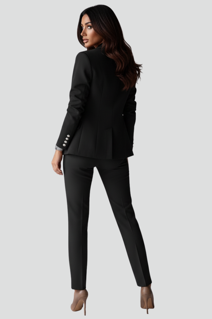 Professional women's tailored two-piece set, blazer & trousers. Elegant business attire for modern women's office wear.