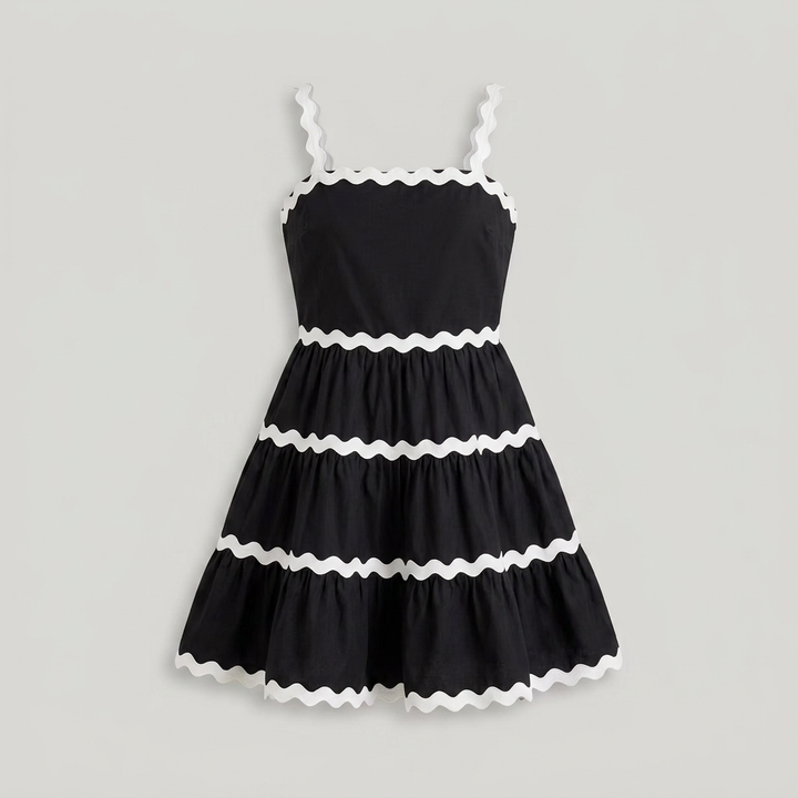 Stylish women's tiered mini sundress with one-shoulder design, perfect for summer casual daytime wear.