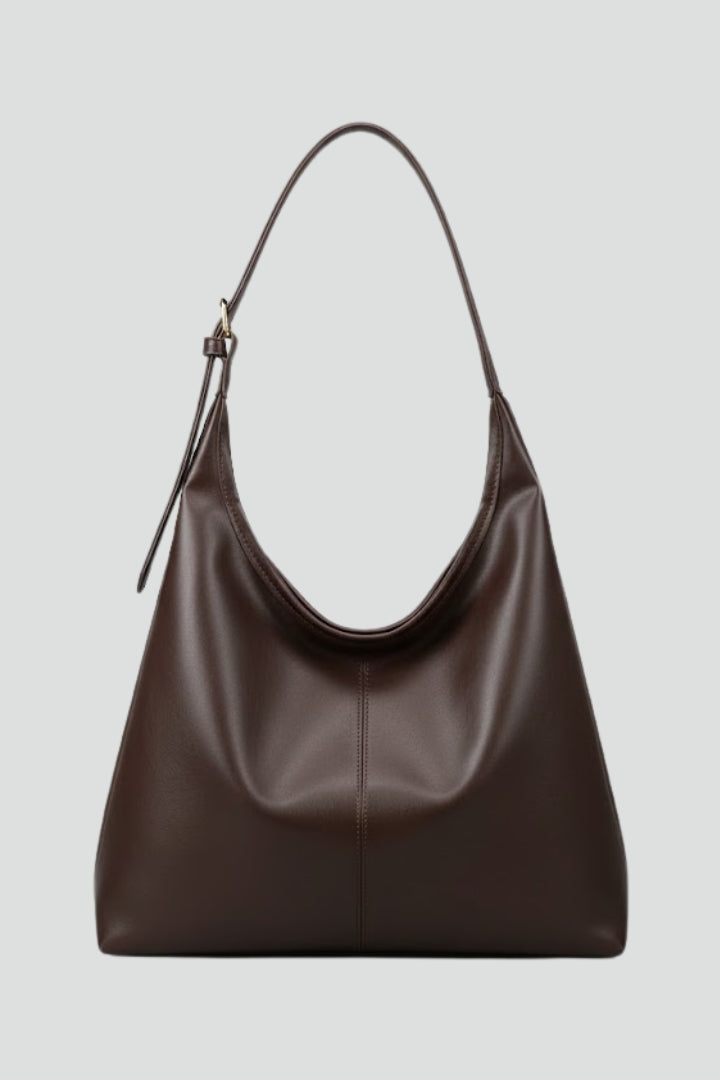 Classic faux leather women's tote bag in coffee, stylish & spacious for everyday carry.