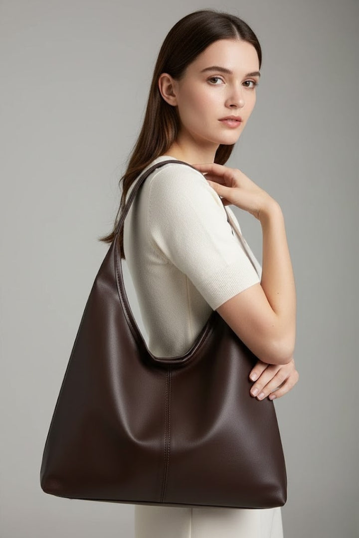 Stylish white women's shoulder bag, classic faux leather tote, perfect for casual fashion.