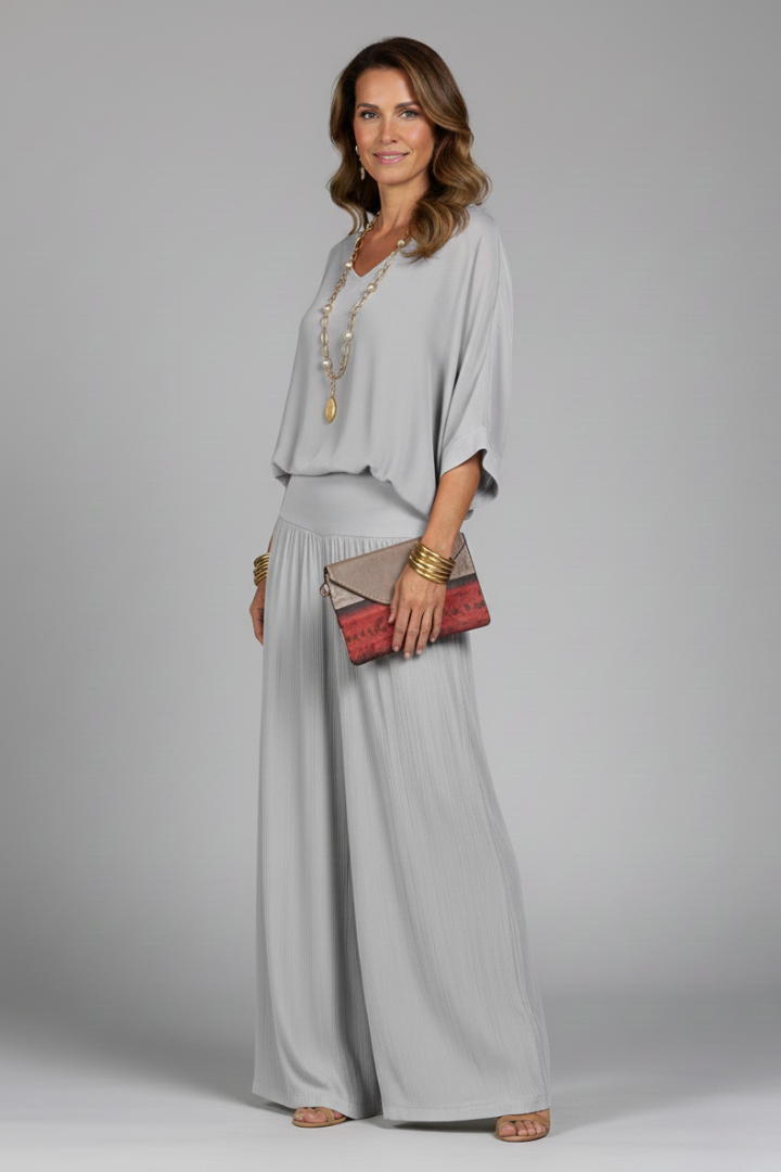 Women's comfortable chiffon two-piece set featuring long wide-leg pants, ideal for warm weather style.