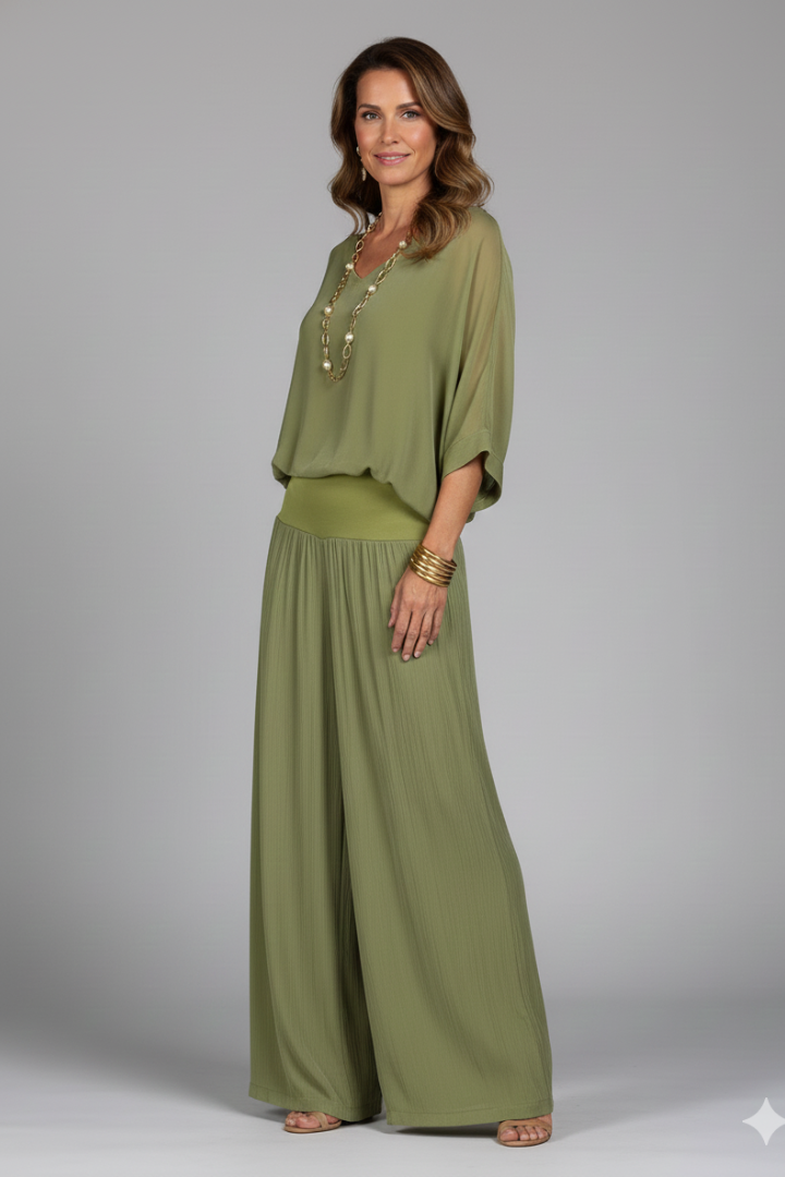 Flowy women's chiffon two-piece set with wide-leg trousers, designed for ultimate comfort & sophistication.