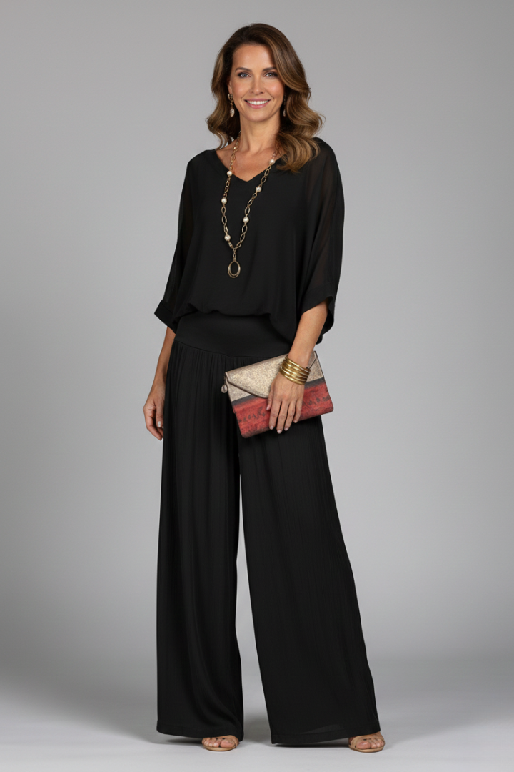 Model in a chic women's chiffon two-piece wide-leg set, showcasing its elegant and flowy silhouette.