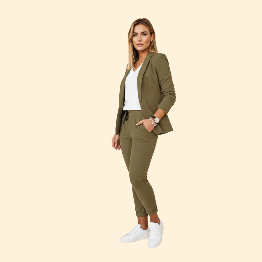 Chic women's long-sleeve blazer and matching drawstring pants; a tailored two-piece set for modern versatile fashion.