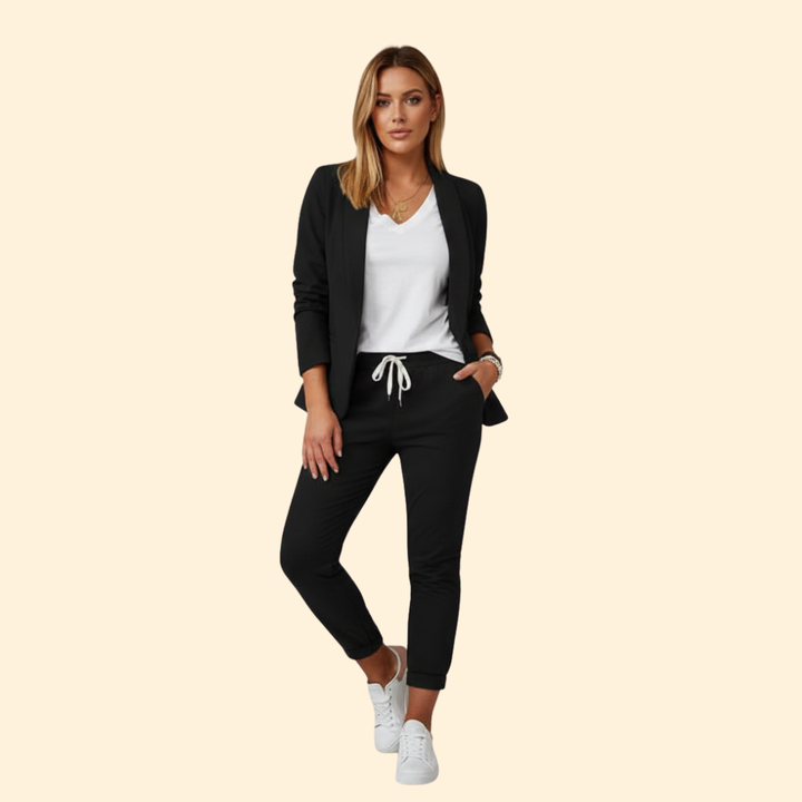 Modern women's two-piece blazer & drawstring pant outfit, combining tailored elegance with comfortable everyday style.