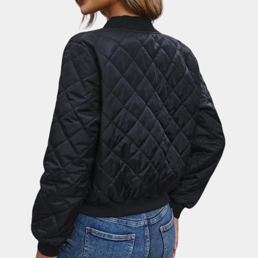 Stylish women's puffer bomber jacket, full-zip for casual urban wear. Trendy autumn & winter outerwear.