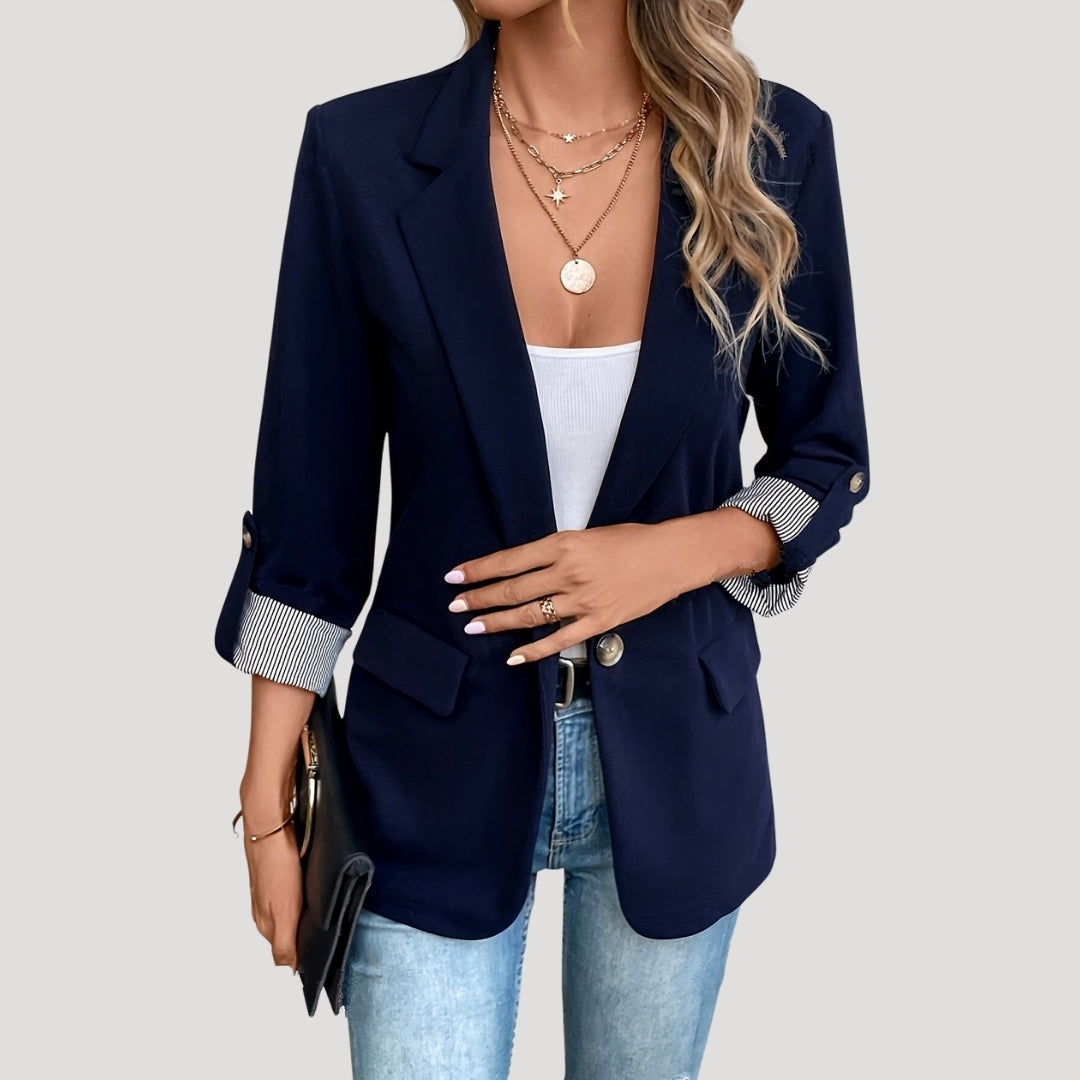 Women's tailored single-breasted blazer with roll-up sleeves. Elegant, versatile, and lightweight for summer workwear.