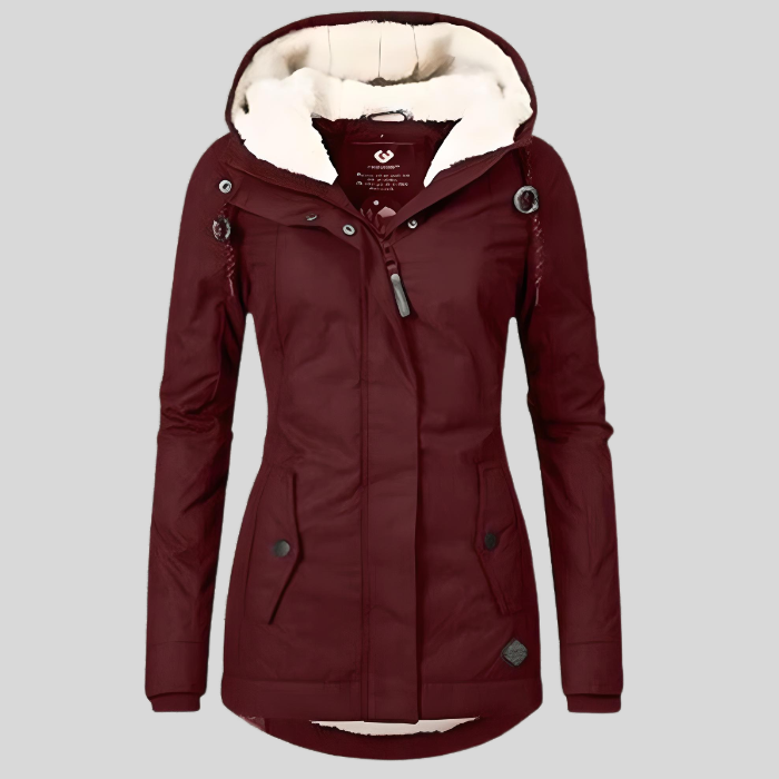 Durable women's insulated waterproof winter coat, ready for snow and severe cold weather protection.