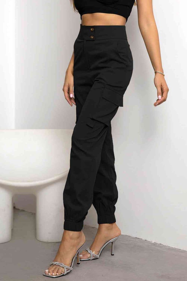 Stylish women's black high-waist cargo pants. Features a modern, sleek fit, ideal for urban & casual outfits.