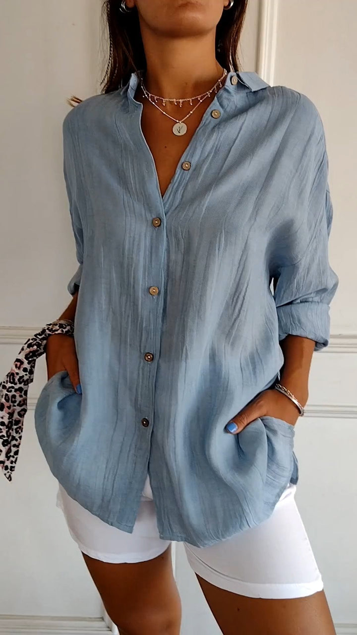 Women's crinkled button-down long sleeve blouse, versatile & chic top.