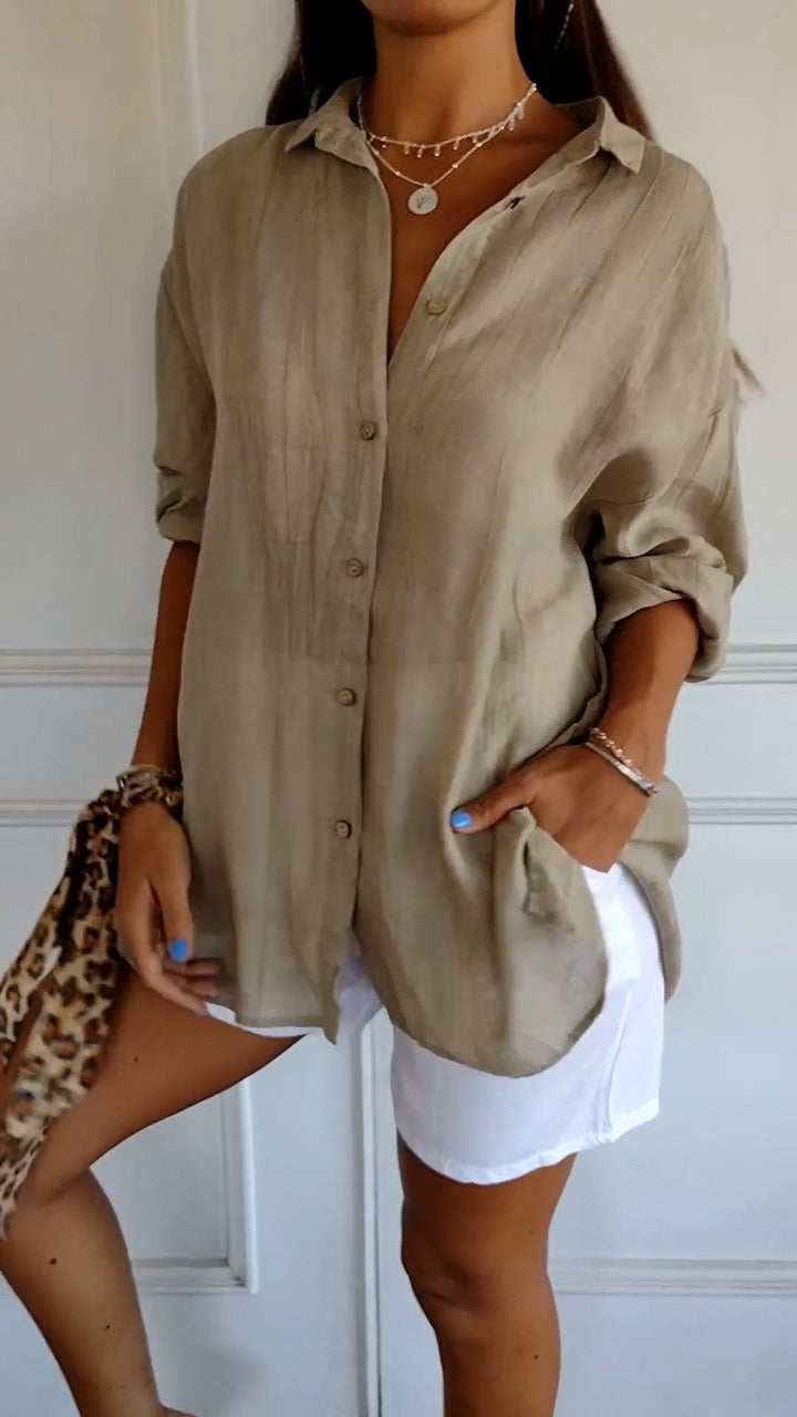 Chic women's crinkled button-down long sleeve blouse, perfect for smart casual wear.