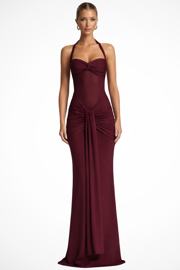 Elegant women's halter neck maxi dress with a sophisticated twist front, ideal for formal occasions.